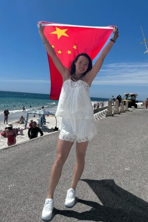 Zheng Qinwen China flag